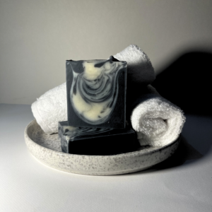 Activated charcoal handmade soap with tea tree, eucalyptus and swirl design
